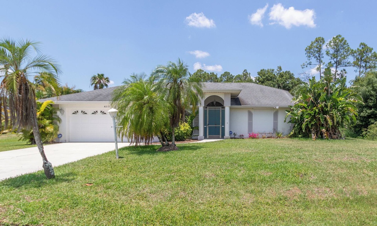 Lehigh Acres Villa | Cozy 2-Suite heated Pool Home with Spacious Lanai and Private Backyard.