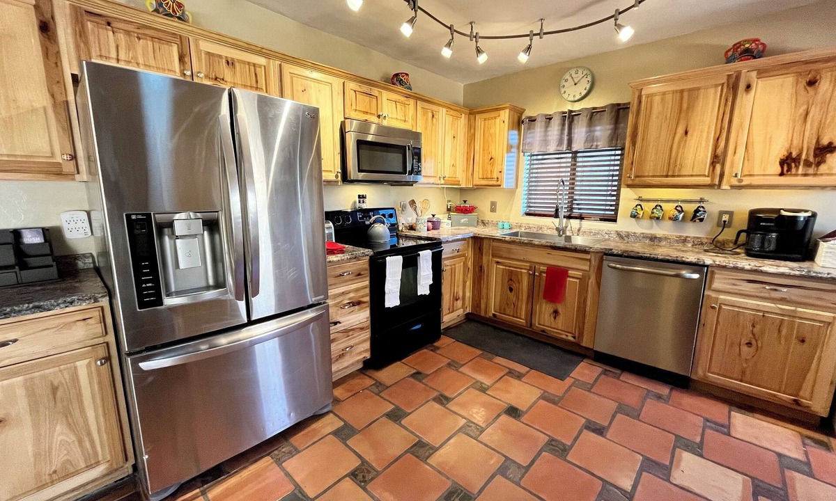 Peter Howell House | Gorgeous pool and spa, Beautiful home, Plenty of space- 10 minutes to U of A!
