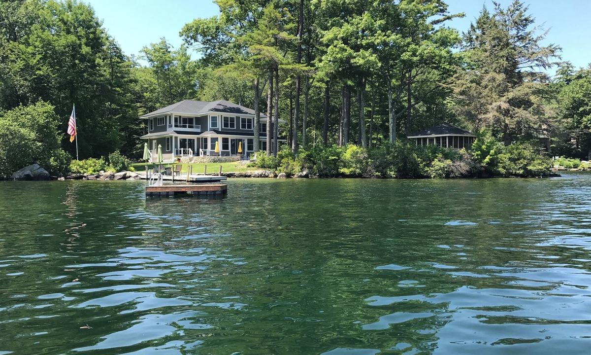 Wolfeboro House | Lakefront 6-bedroom, 3.5 bath house with 2 docks & sandy swim area in Wolfeboro