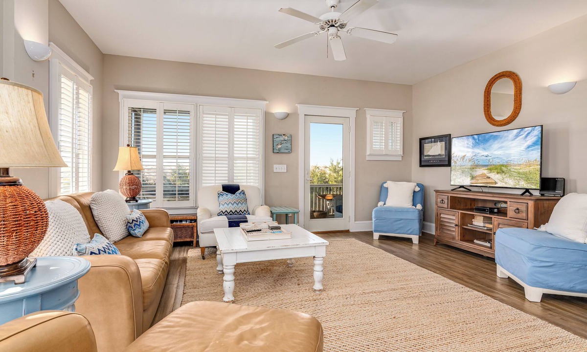 South Beach House | Ocean front duplex with master balcony overlooking the beach; newer six passenger golf cart