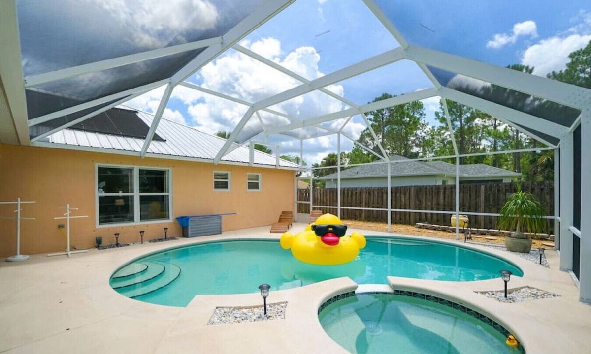 Palm Coast House | Pelican Palm - Poolside summer escape!