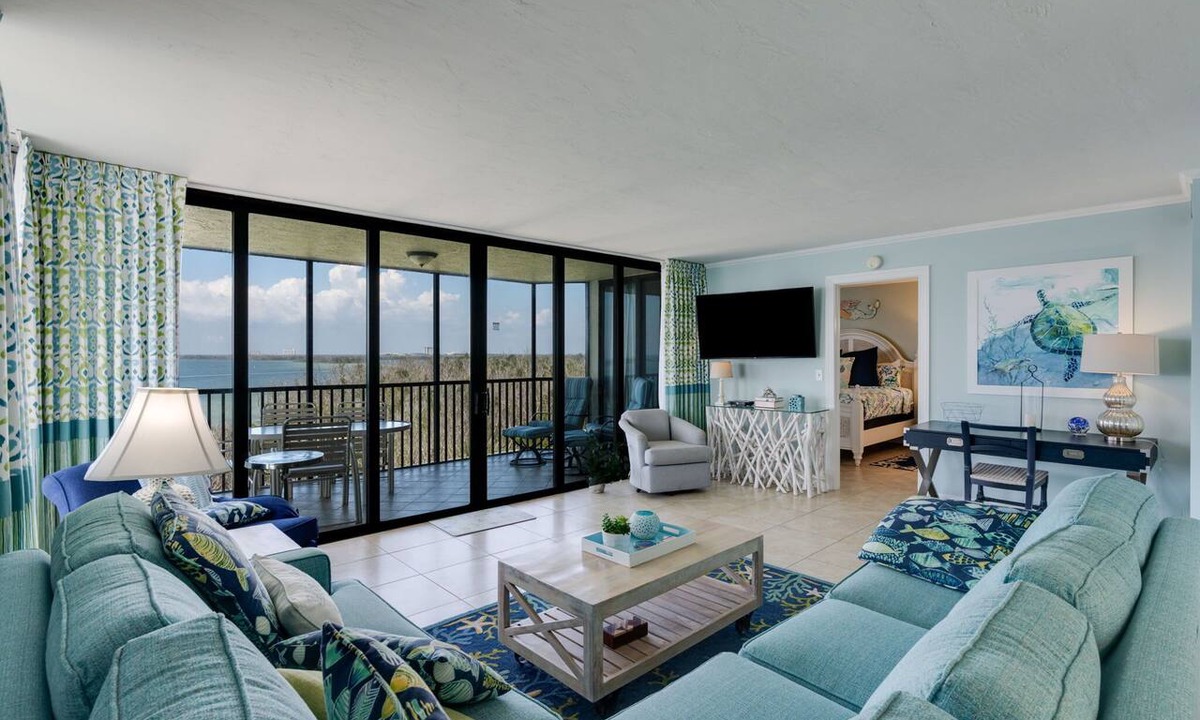 Punta Rassa Condo | Pristine Waterfront Residence with Panoramic Water Views - Pool Open!
