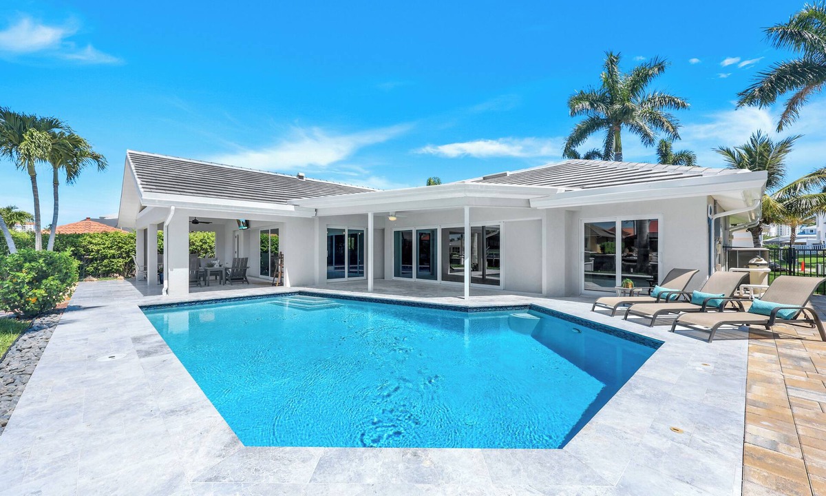 Vanderbilt Beach House | Sunny Side! – Southern Exposure - Heated Saltwater Pool! Walk to Beach!