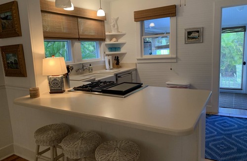 Downtown Boca Grande Historic District House | Blissfully Serene Palm Cottage In Town and 2 Blocks from Beach