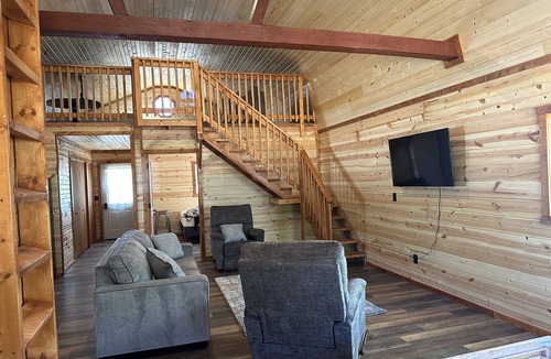 Warrensburg Cabin | Blue Cabin in the woods close to Whiteman AF Base and Univ. of Central Missouri
