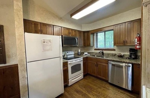 Mount Ida Cottage | C8, Two bedroom, two bath log-sided, lake view luxury cottage with hot tub by RedAwning
