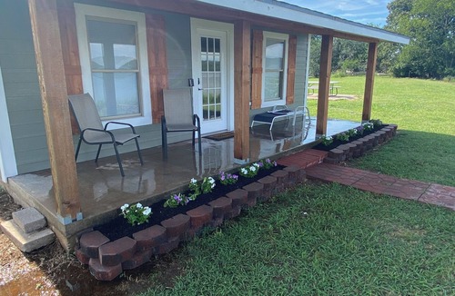 Adair Cabin | Charming cabin with Heat/AC in Pryor area- Perfect for a cozy couples getaway.