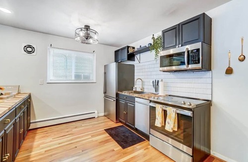 Roselawn Finance Apartment | Cincinnati 2BR Corporate Stay, Garage Parking