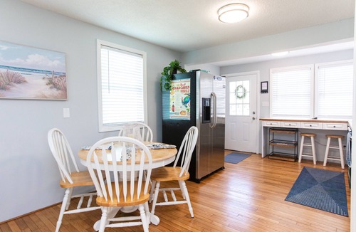 North Carolina Coast Cottage | Classic Beach Cottage with front porch view of water