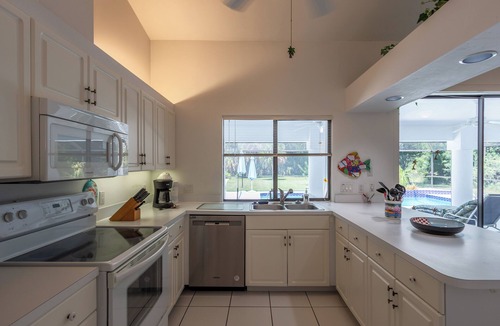 Lehigh Acres Villa | Cozy 2-Suite heated Pool Home with Spacious Lanai and Private Backyard.