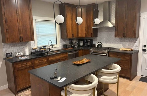 Rochester House | Custom Luxury Rambler in Highland Hills, Rochester