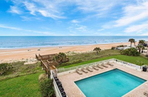 Seawinds Condo Apartment | Direct oceanfront 2/2 condo with a private balcony, heated beachfront pool, and garage