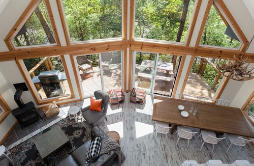 Anderson Island House | Dog Friendly Island Getaway with Hot Tub + Fireplace, nestled amongst the trees