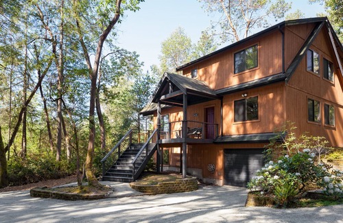 Anderson Island House | Dog Friendly Island Getaway with Hot Tub + Fireplace, nestled amongst the trees