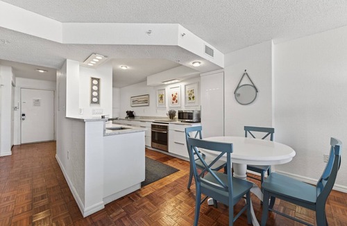 Seawinds Condo Condo | Ground floor direct oceanfront 2/2 with a balcony, heated pool, and garage parking