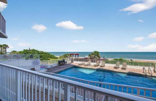 Seawinds Condo Apartment | Ground floor direct oceanfront 2/2 with a balcony, heated pool, and garage parking