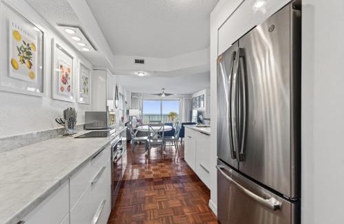 Seawinds Condo Apartment | Ground floor direct oceanfront 2/2 with a balcony, heated pool, and garage parking