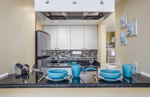 Siesta Key Condo | Heated Pool & Private Lanai in Tropical Siesta Key. Just 30 Feet from the Intracoastal!