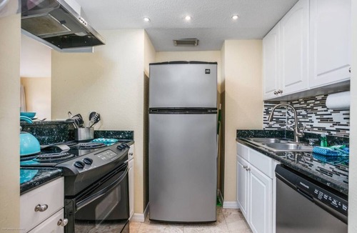 Siesta Key Condo | Heated Pool & Private Lanai in Tropical Siesta Key. Just 30 Feet from the Intracoastal!