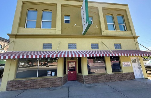 Globe Apartment | Historic King Suite in Upton's Confectionery