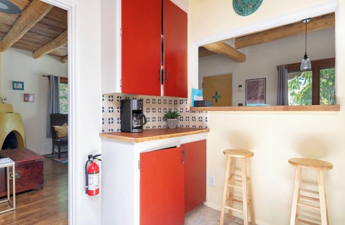 Southside House | Kiva Cottage | Fireplace, Patio + Foosball Table!