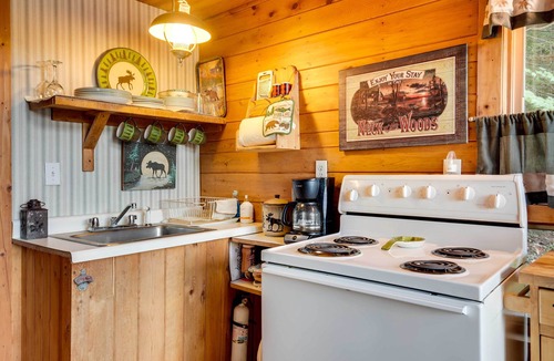 Hill Cabin | Lakefront Ogema Vacation Rental Cabin w/Fire Pit!