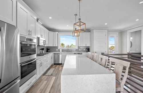 Butler Beach House | LUXURY 8BR OCEANFRONT, LARGE HEATED POOL, FOOSBALL, SLEEPS 22!