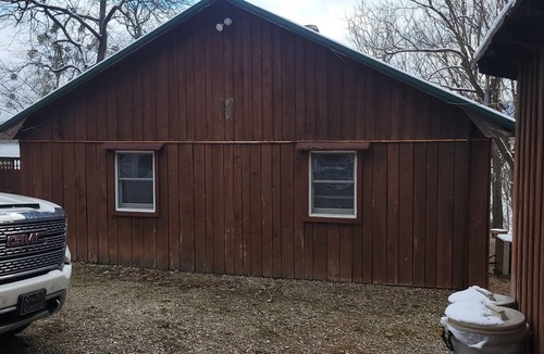 Derby Cabin | Merrymaker Cabin Riverfront with hot tub and Wi-Fi sleeps 8