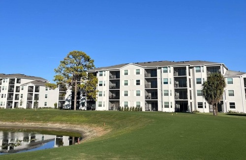 Lehigh Acres Apartment | New 3rd-Floor Condo on Golf Course (Golf Included)