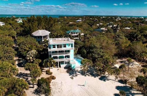 North Captiva House | NEW LISTING! OCEAN PARADISE: BEACHFRONT, SLEEPS 12, 2 CARTS, POOL, GAMES, & FUN