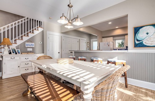 South Beach House | Ocean front duplex with master balcony overlooking the beach; newer six passenger golf cart