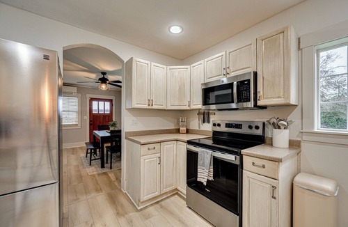 Meadow Glade House | Park like setting and fenced, 3 bed 2.5 bath updated 1920 farmhouse-Covered Deck