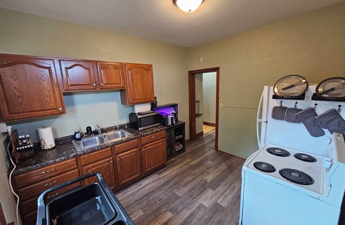 Chippewa Falls Apartment | Private Game Haven & Multimedia Party Room - 2br Sleeps 7
