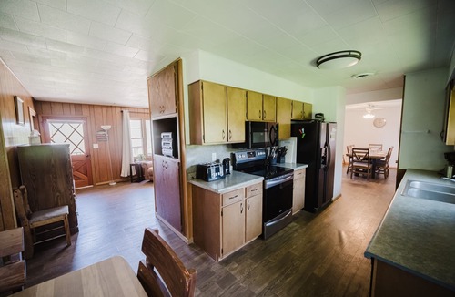 Chamberlain House | River front, Spacious, Clean, Large yard, decks, fire pit, adequate parking