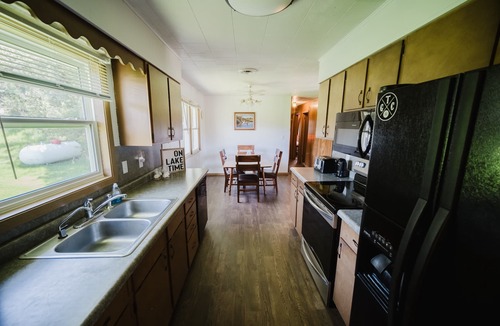 Chamberlain House | River front, Spacious, Clean, Large yard, decks, fire pit, adequate parking