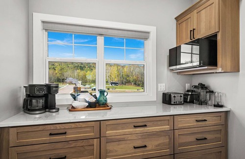 Riverside House | RiverWest Island View - Dog Friendly - Sauna - River View