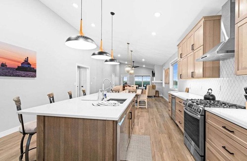 Duluth Apartment | RiverWest Superior Chalet - River Front - Sauna - Dog Friendly