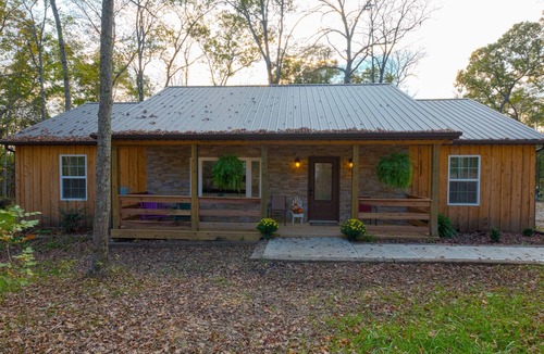 Winchester Cabin | Rustic Cabin with modern amenities and 1 acre stocked Fishing Lake !