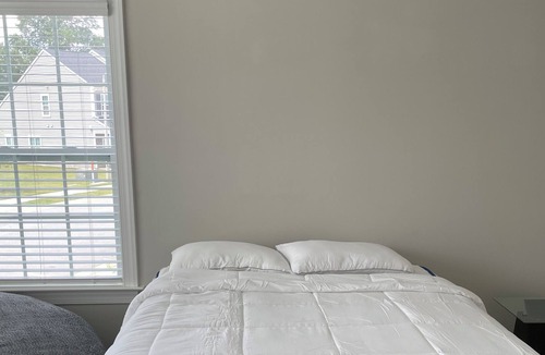 Fuquay-Varina House | Spacious Bedroom with Private Bathroom