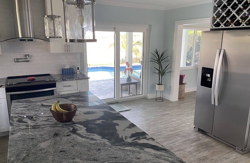 North Naples House | Stunning Waterfront Retreat with Private Pool and beautiful entertaining space.