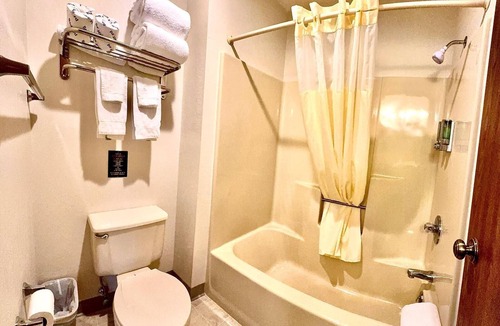 Boulder Junction Apartment | Two queen beds, private bathroom, mini fridge, and single-serve coffee maker.