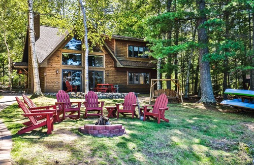 Eagle River Cottage | Waterfront getaway with wood fireplace, dock, & lakeside deck