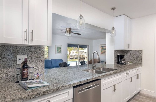 Garden Isles House | Waterfront Heated Pool + SUPs - 5BR Fun Stay!