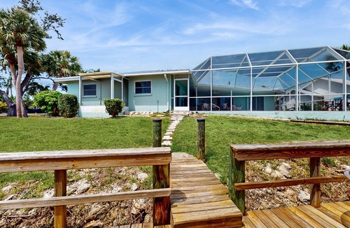 Sorrento Shores House | Waterfront home with pool, dock accessible to Gulf, dog friendly with AC & WD