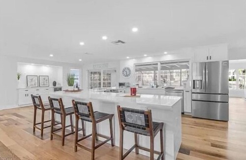 Coquina Sands House | Waterfront paradise walking distance to the beach & minutes to downtown Naples!