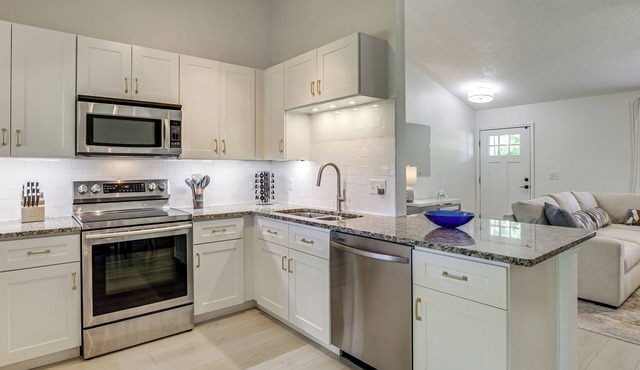 < 1 Mi to Butler Beach! Home w/Dog-friendly Yard