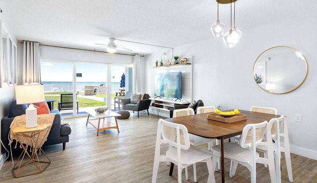 Beachfront Comfort: Ground-Floor Unit with Stunning Views, Heated Pool & BBQ Grill!