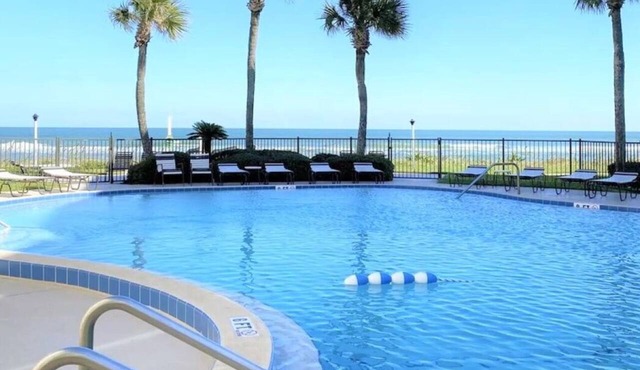 Beachfront Condo with Pool. Book today!