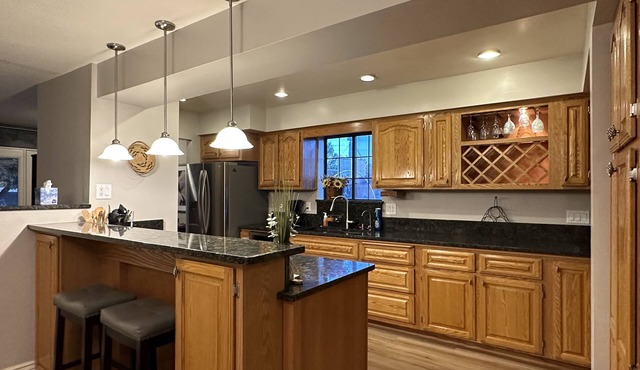 Beautifully updated house with 2 master suites, hot tub & great patio space!