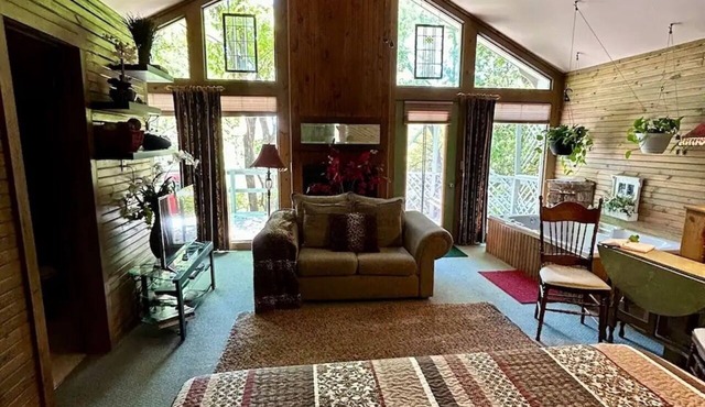 Best Views in Eureka Springs from this Mountain Cabin with Full Glass Front